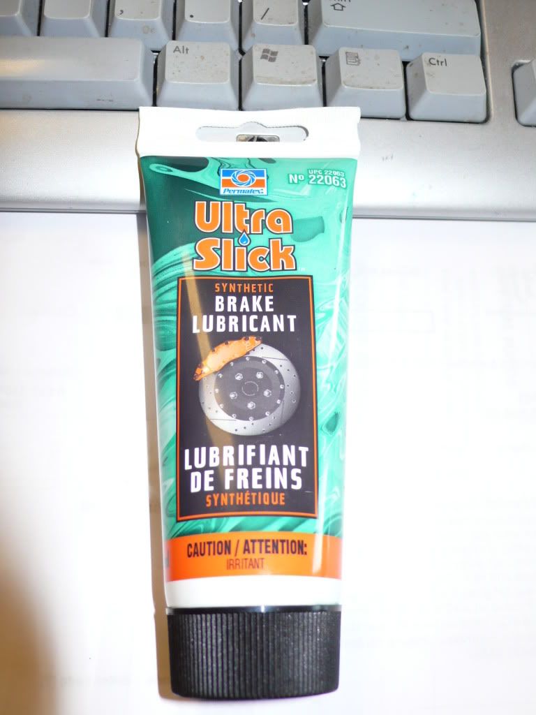 Brake assembly lube for caliper piston seal